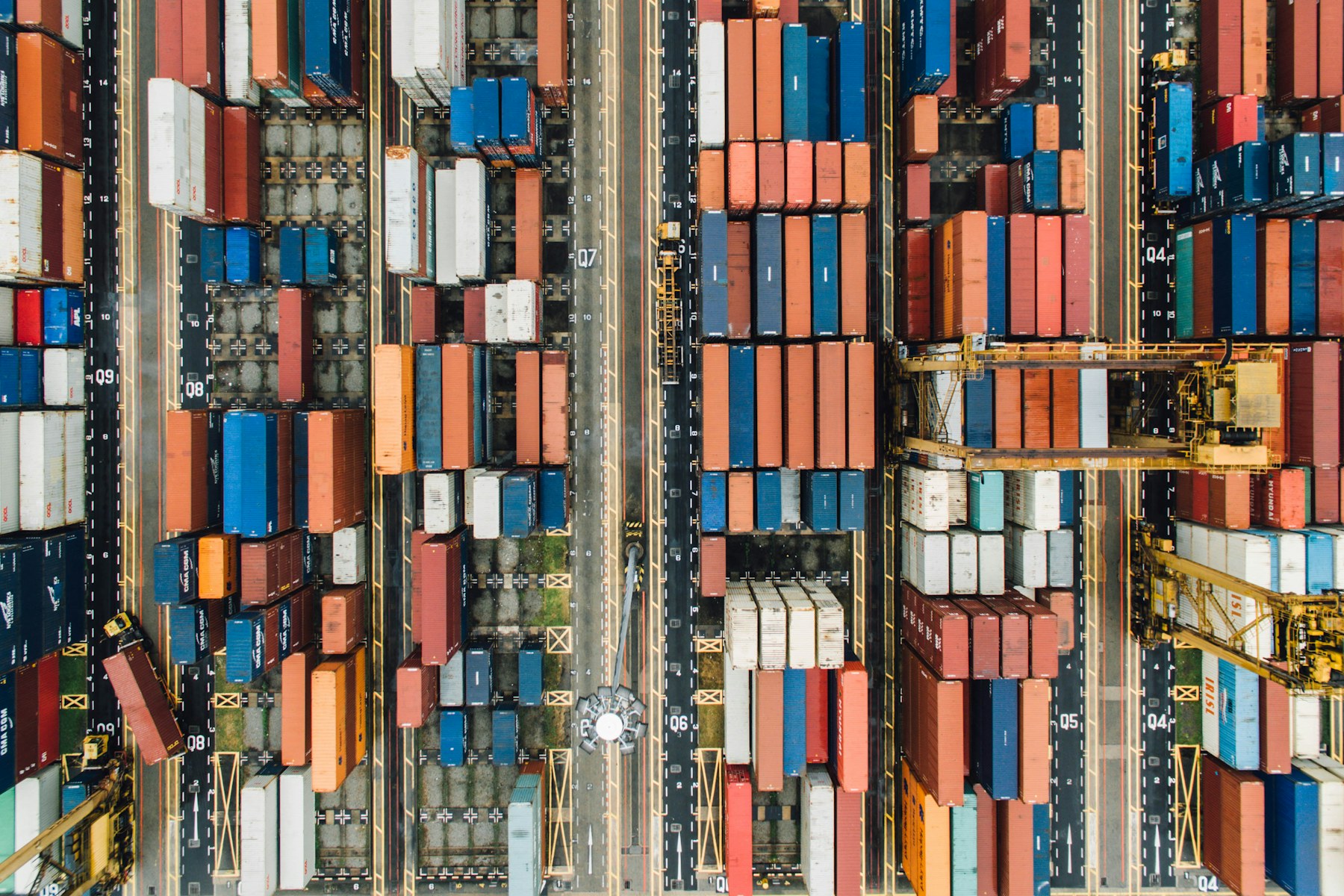 Shipping containers arranged at a port